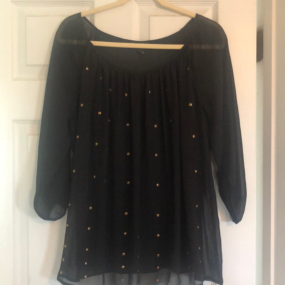 Sheer black top, lined, adorned with brushed brass accents, sz large